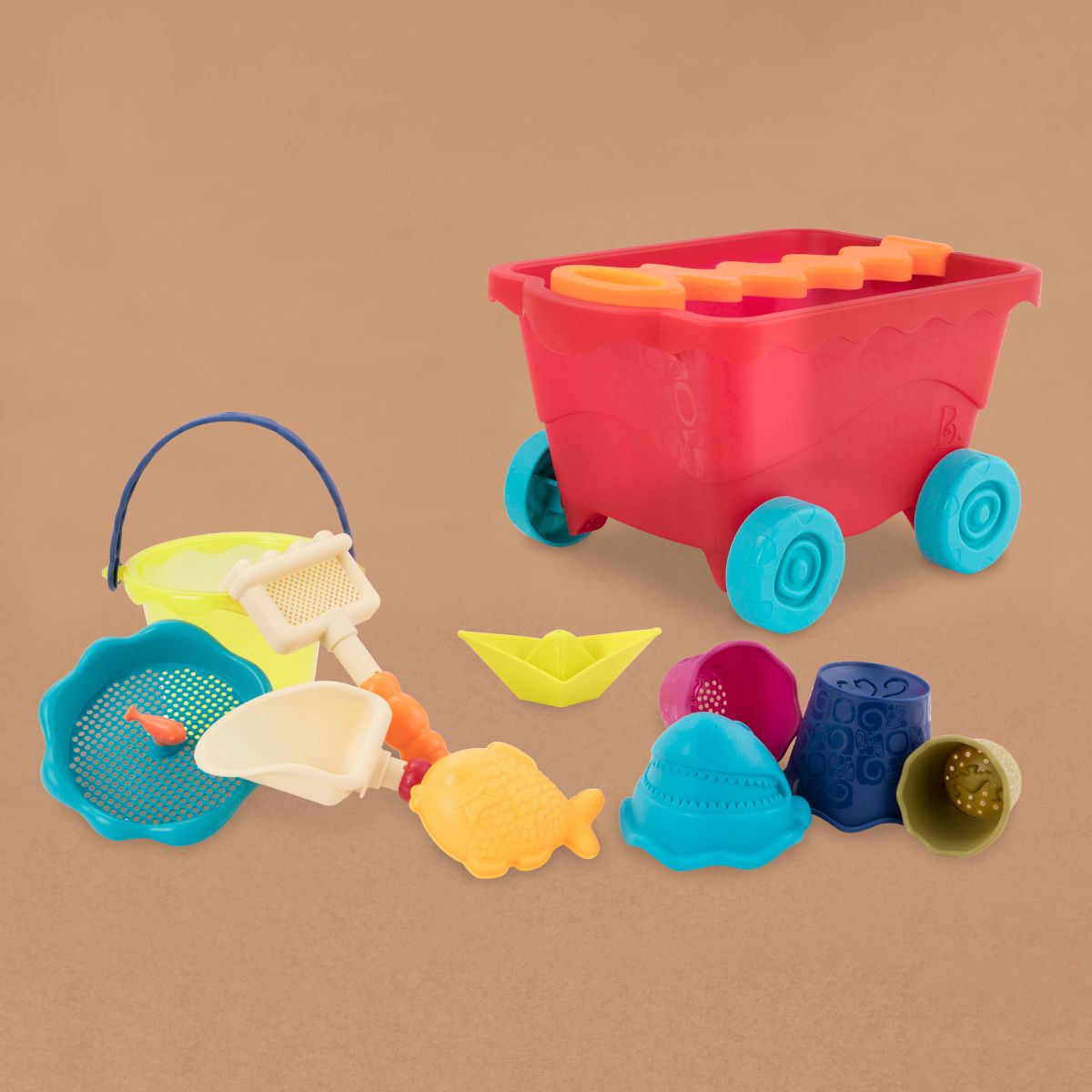 Beach toys and translucent red wagon