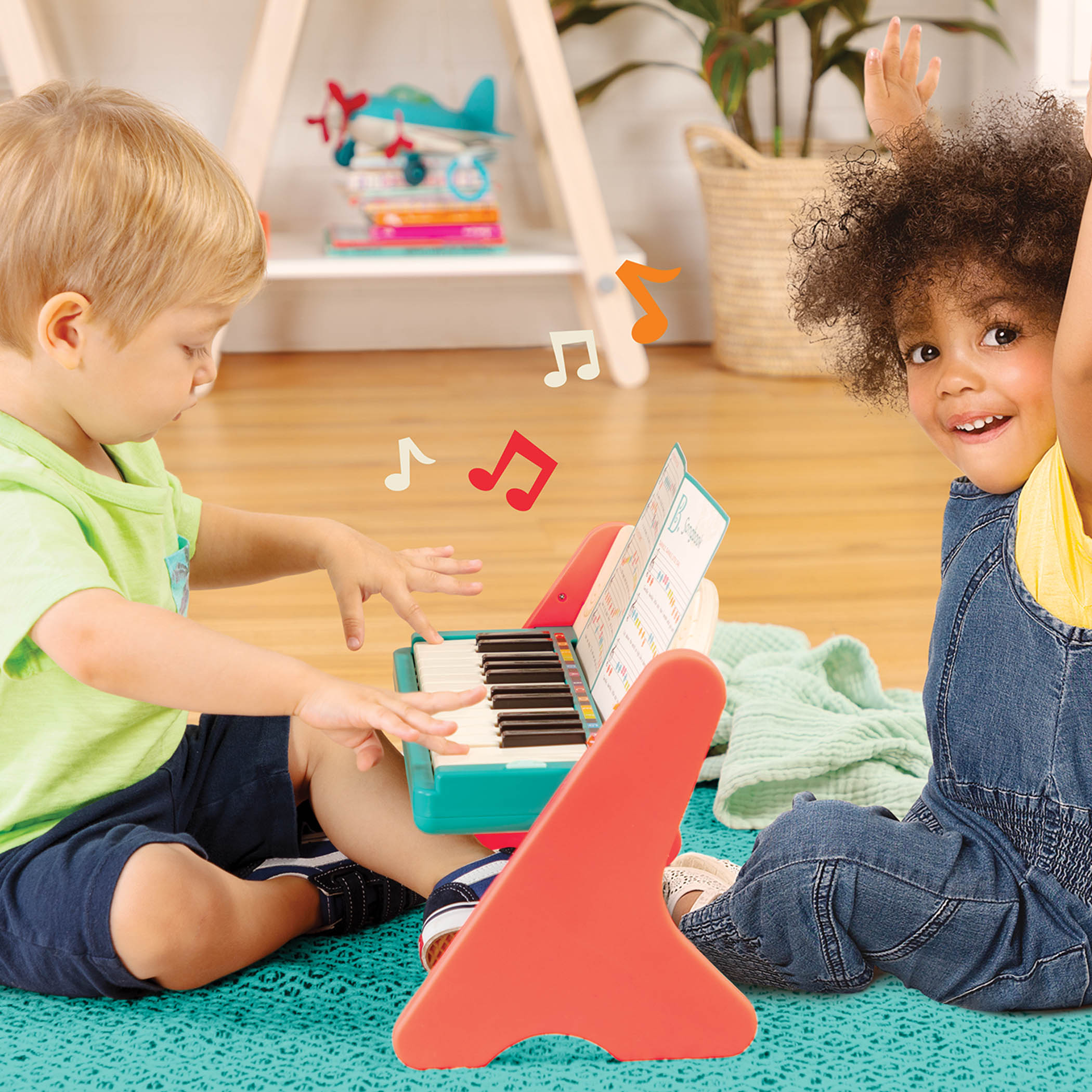 Wooden toy piano with songbook.